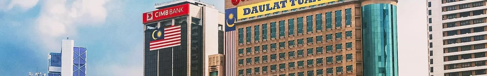 Scenic view of Kuala Lumpur's skyline featuring modern skyscrapers and iconic architecture.